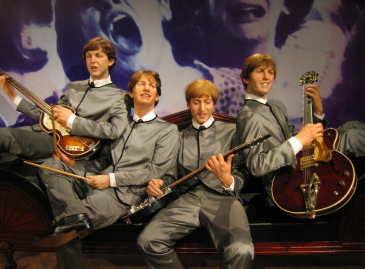 File:The Beatles wax dummes (2).jpg - the man is wearing a suit